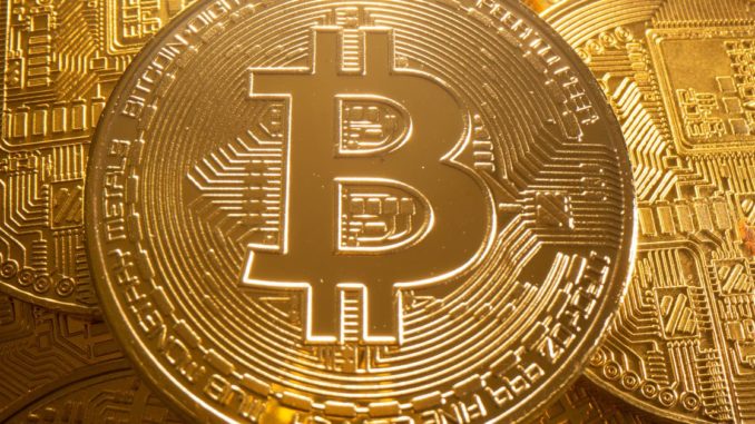 Bitcoin rises 5 percent to $49,106